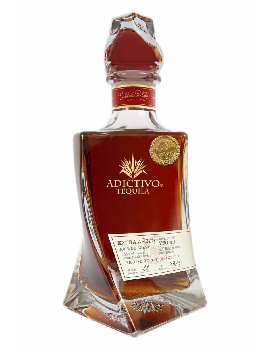 Caja de tequila Adictivo tipo Extra añejo 4 piezas 750 ml c/u